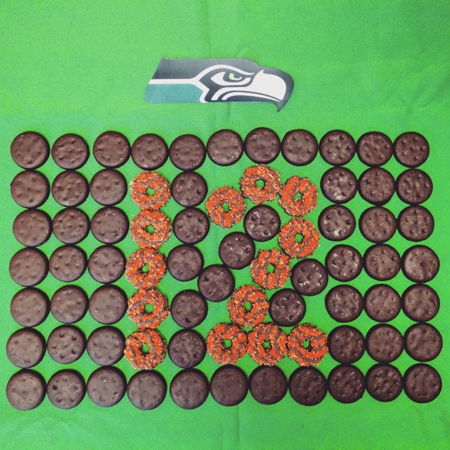 Seahawks logo and "12" in Girl Scout Cookies
