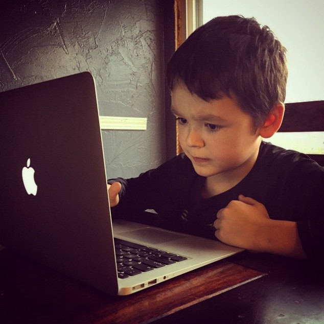 Parker at his dad's laptop.